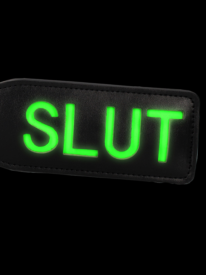 https://www.poppers-italia.com/images/product_images/popup_images/ouch-glow-in-the-dark-slut-paddle__2.jpg